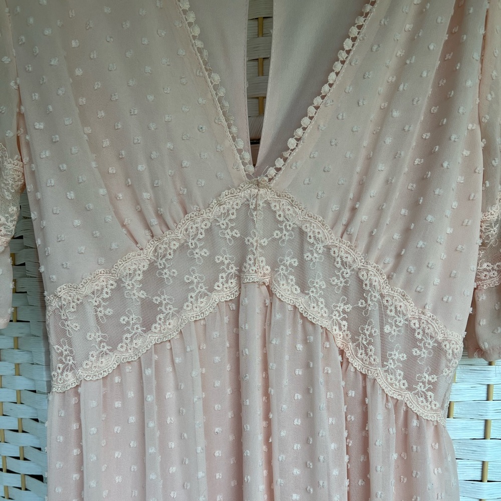 Light pink maxi dress with little round puffs!